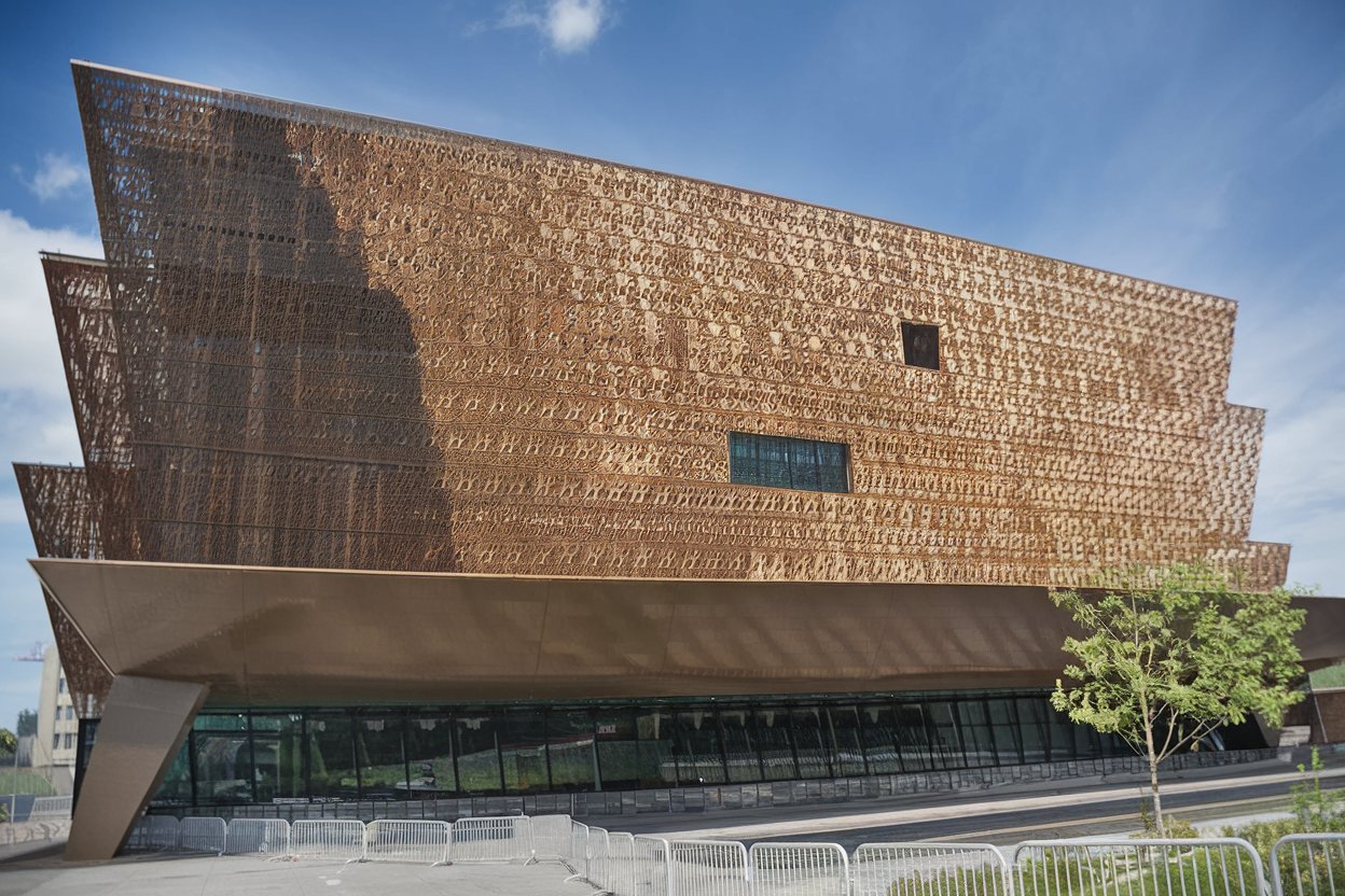 The striking facade of the National Museum of African American History and Culture in Washington, D.C., with its unique bronze lattice design