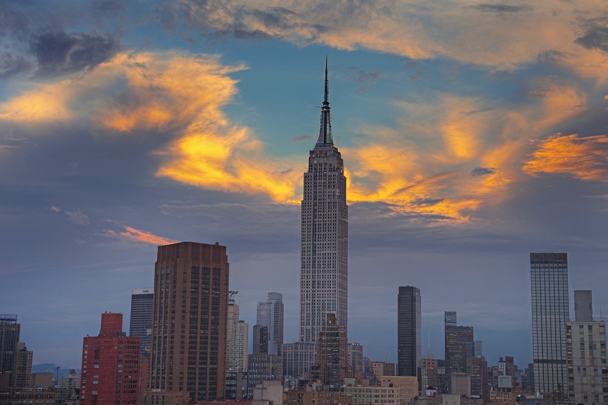 The Empire State Building, an iconic symbol of New York, offers stunning 360-degree views from its observation decks on the 86th and 102nd floors. Known for its Art Deco design, the building features a historic lobby, colorful lighting displays, and is a must-see for visitors wanting to experience the city from above