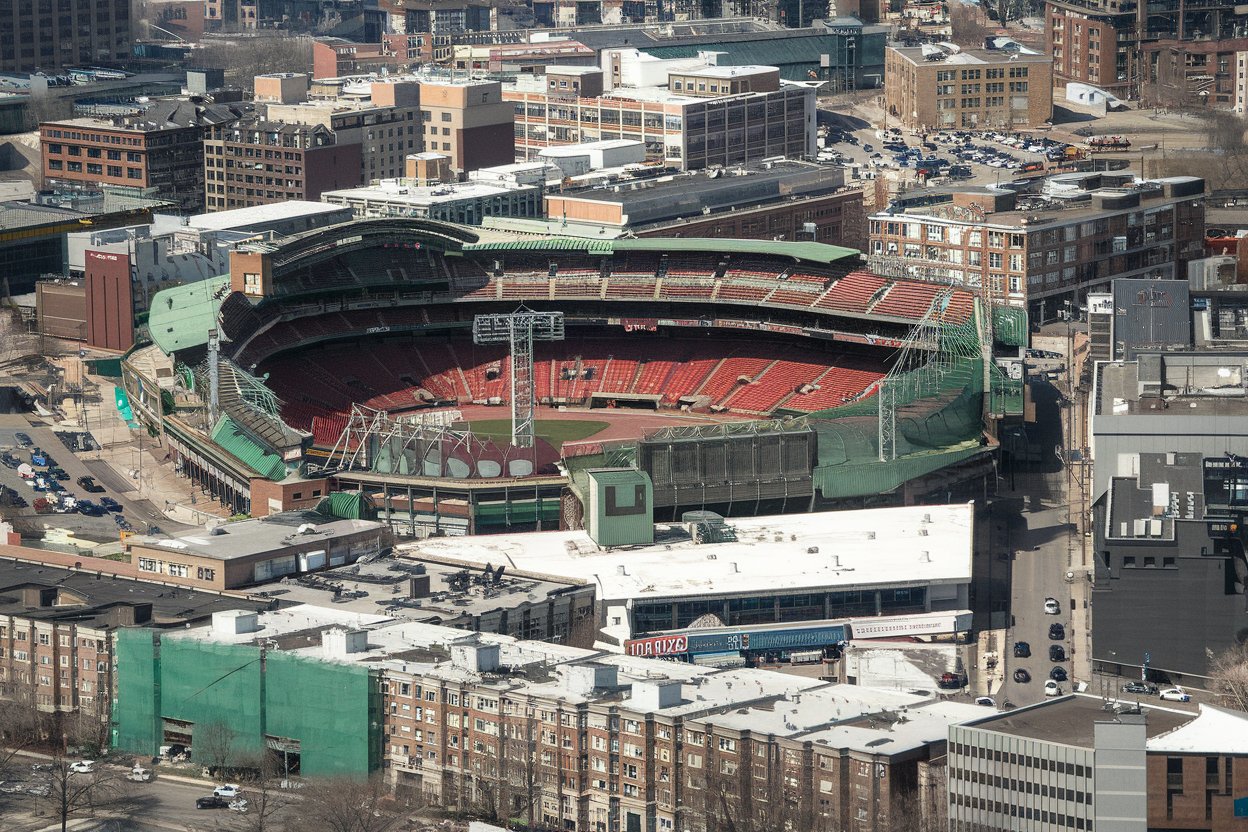 Fenway Park, home of the Boston Red Sox and one of MLB's oldest ballparks, offers a behind-the-scenes tour of iconic features like the Green Monster and Pesky Pole. Watching a Red Sox game here is an exhilarating experience, with a lively atmosphere and classic food offerings like Fenway Franks and clam chowder